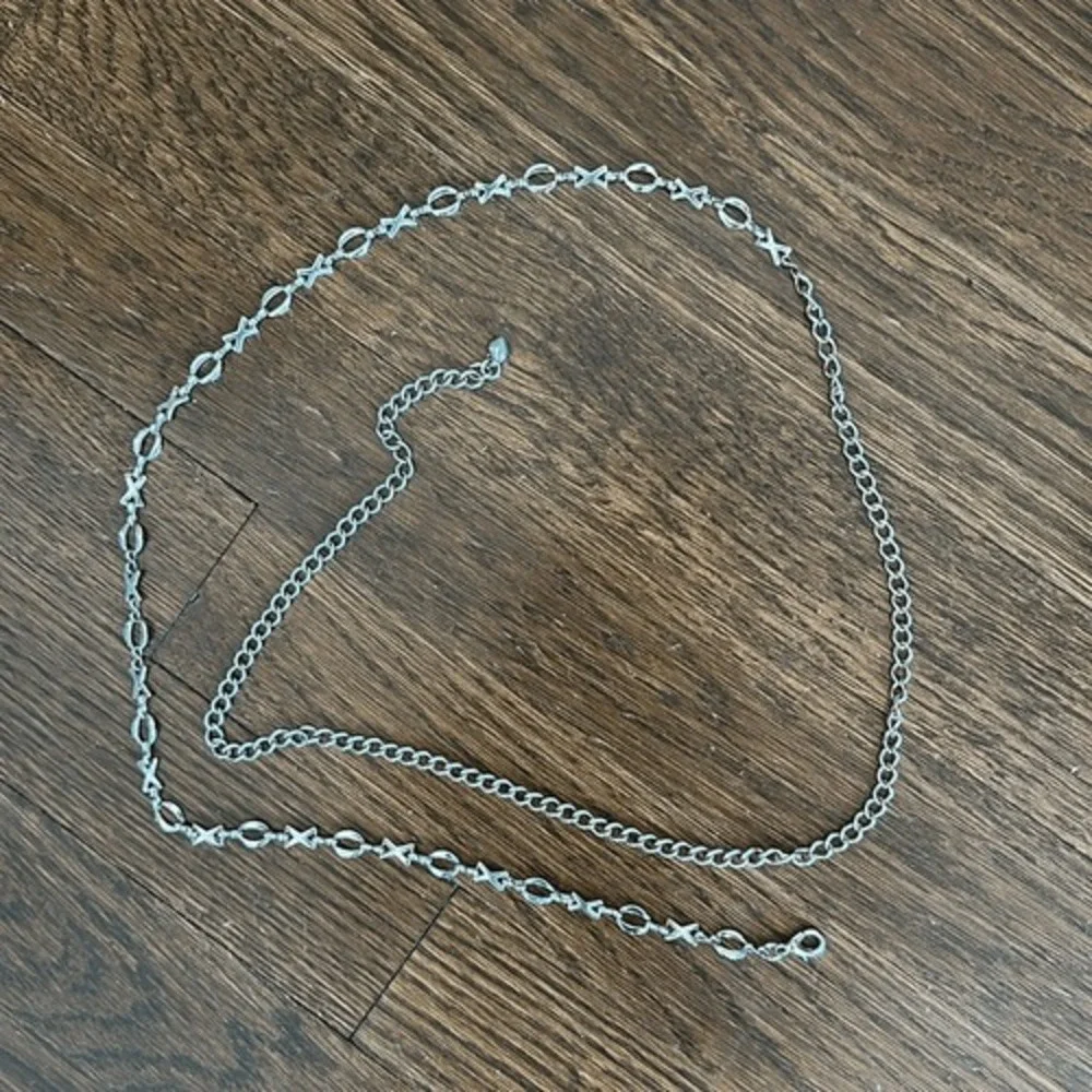 Gold tone XOXO thin metal chain belt